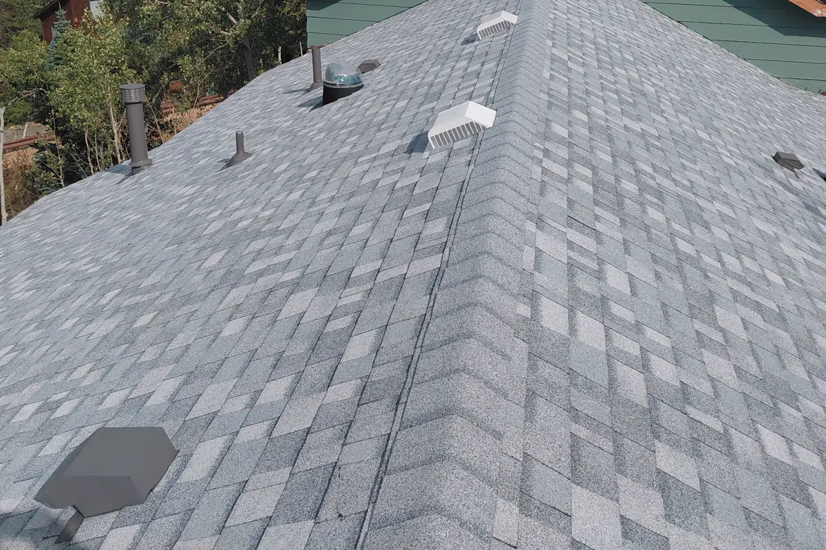 Close-up of a newly installed Class A architectural shingle roof with box vents